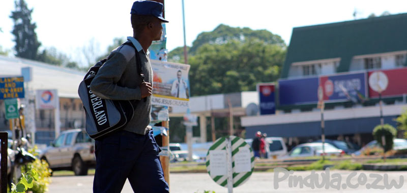 Police Officer Carrying Backpack