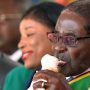 Robert Mugabe having Ice Cream