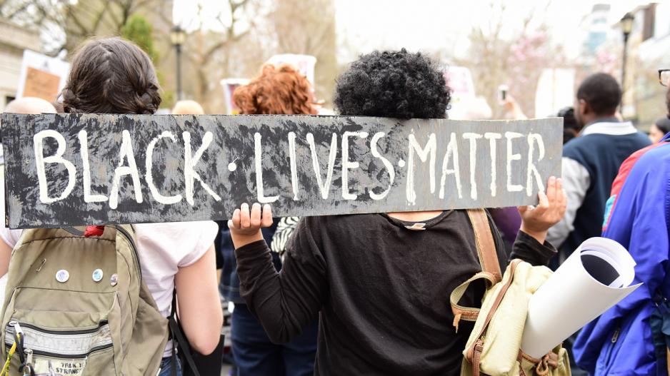 Black Lives Matter with backpacks elite school racism zimbabwe top