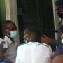 Zimbabwean nationals wearing masks