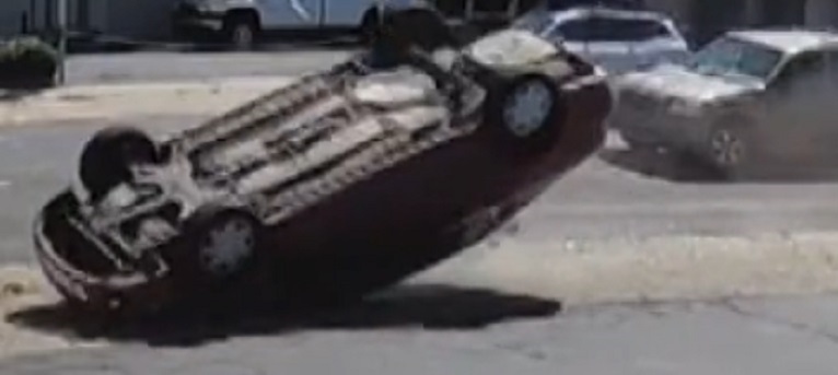 Car caught after stolen car overturned