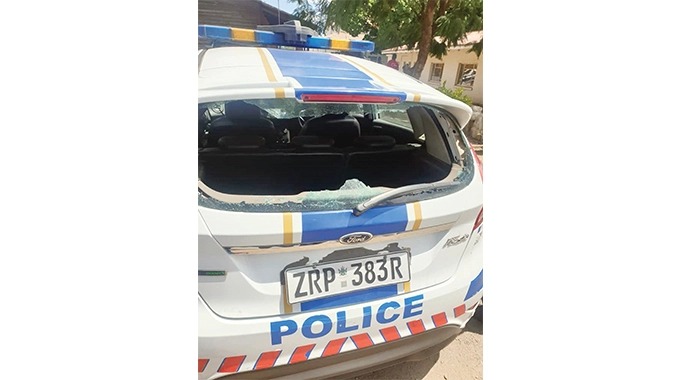 Police vehicle smashed window screen