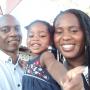 Nyasha Mugwagwa seen with his wife and young daughter