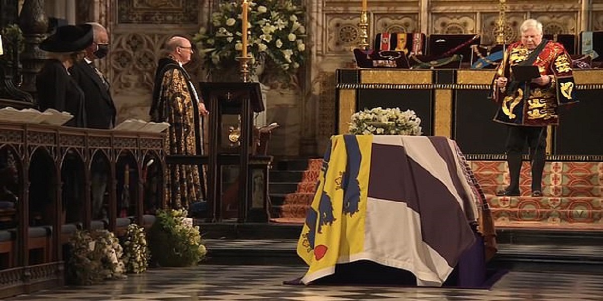 PRINCE PHILLIP's COFFIN LOWERED INTO VAULT