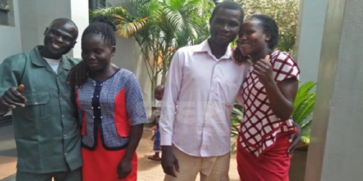 two men exchange wives