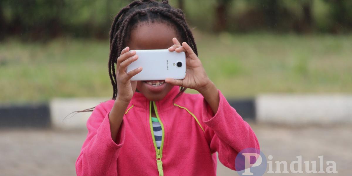 Kid with Phone Camera
