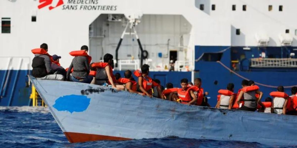 A group of migrants and refugees rescued by crew members of a ship operated by Doctors Without Borders off the coast of Libya [File: Darrin Zammit Lupi/Reuters]